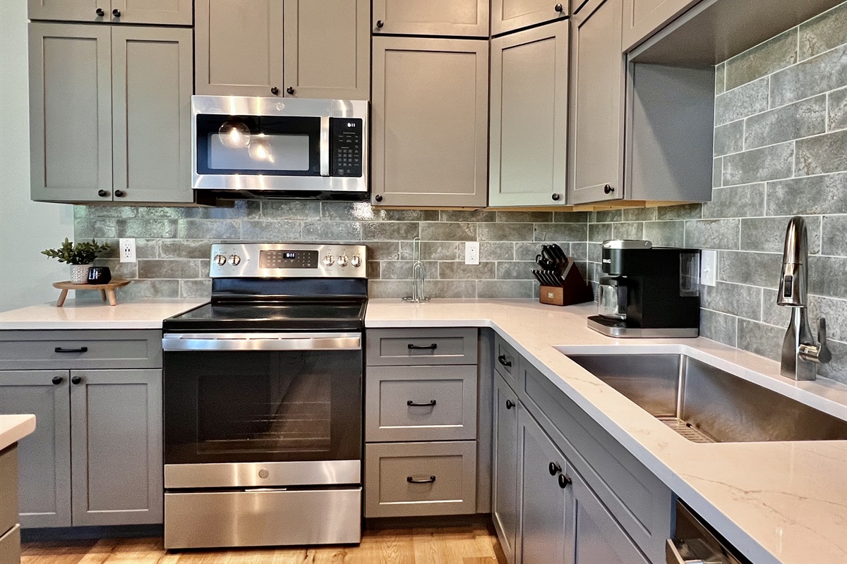 Beautiful open kitchen will all your baking and cooking needs!