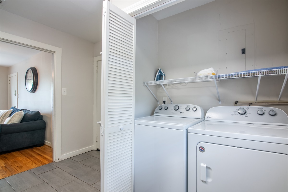 In-unit laundry area with washer and dryer—ideal for long or short stays.