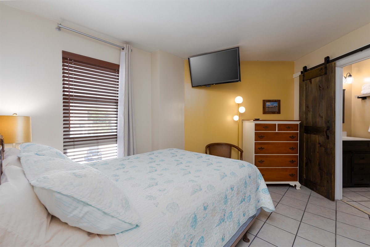 Bedroom's layout is functional and inviting