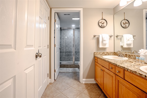 Ensuite with double sinks and tiled walk-in shower