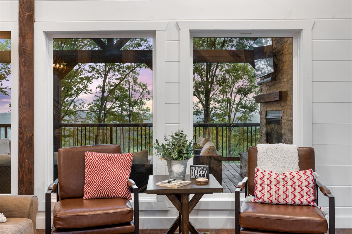 Cozy sitting nook with peaceful forest views and inviting natural light