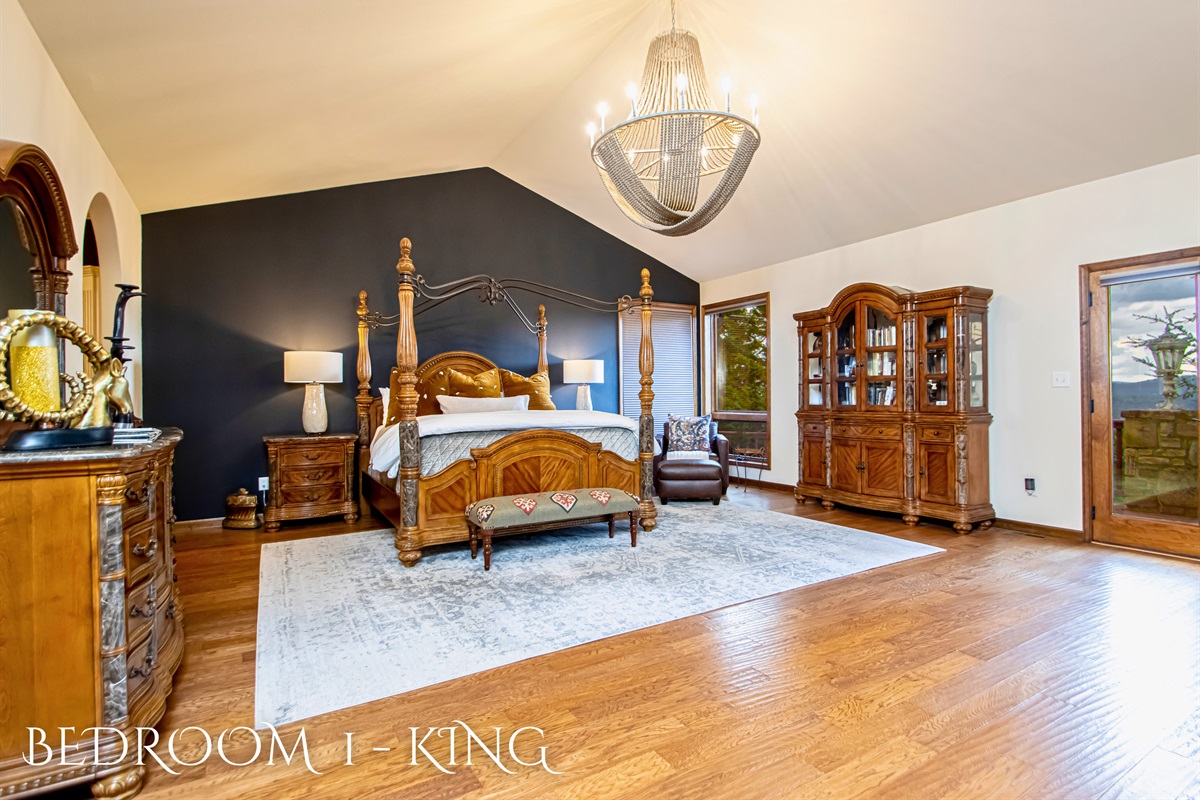 Primary Bedroom with a King Size Bed and Bright Lighting