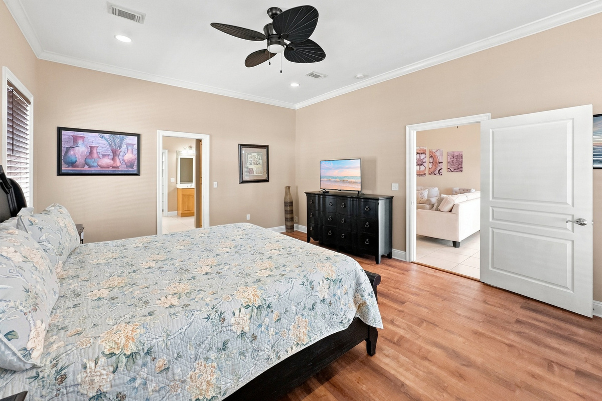 Guest bedroom with roomy closet and ceiling fan