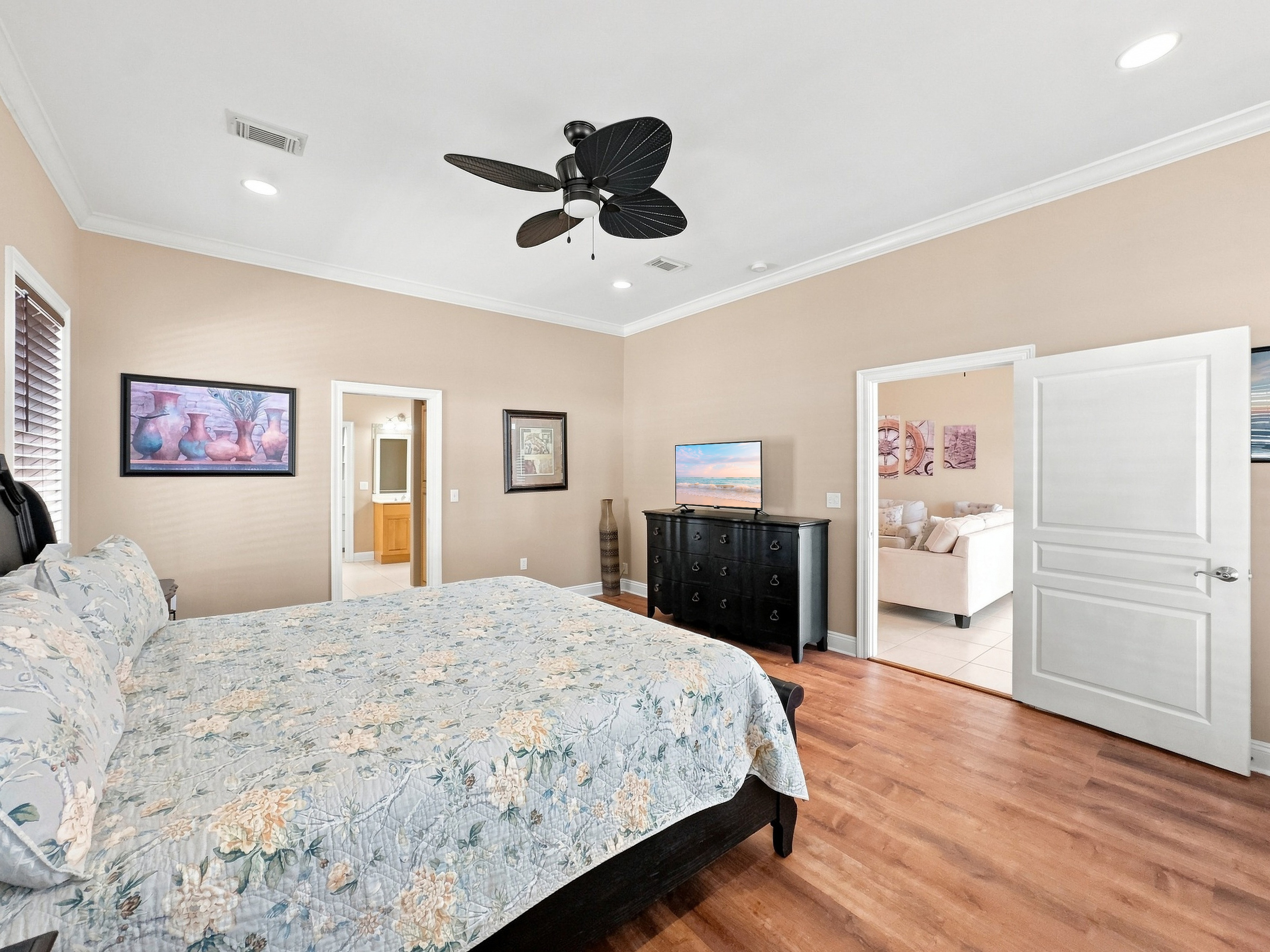 Guest bedroom with roomy closet and ceiling fan
