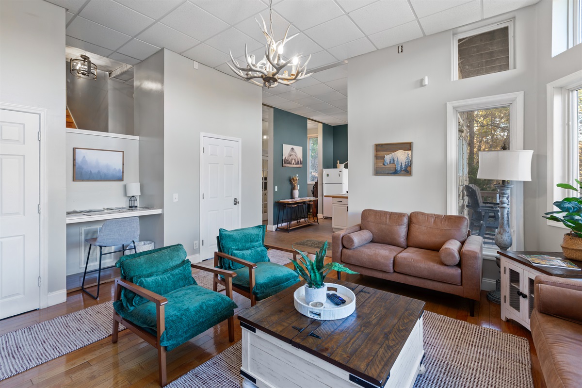 Coffee table foosball and additional TV in the lower level living room.