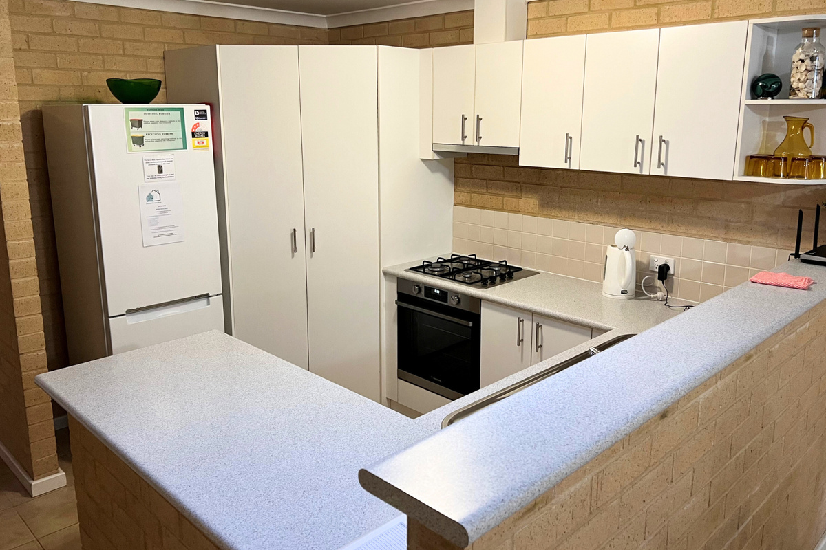 Lovely modern kitchen with coffee pod machine & underbench microwave