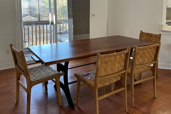 Comfortably seat six at our table with four chairs and a bench