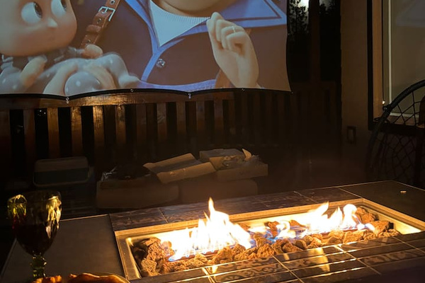 Enjoy a movie by the fire on our outdoor projector 