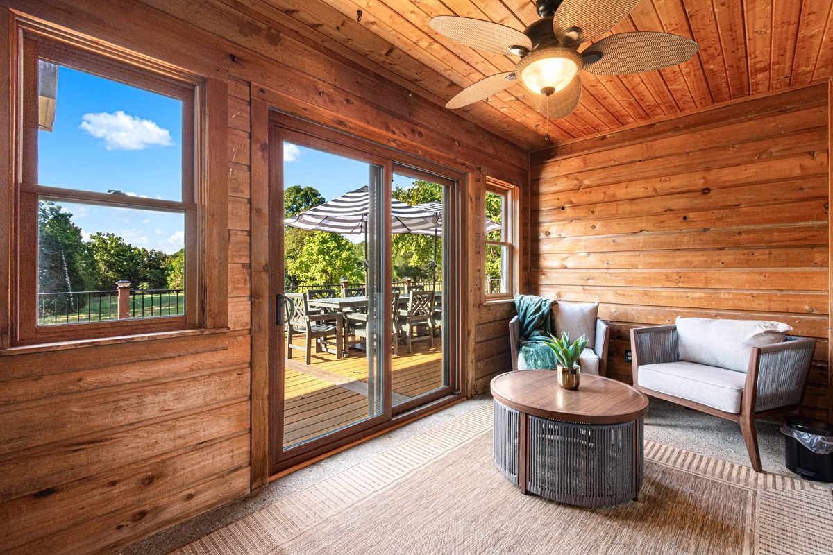 Heated and cooled sun room adjacent to the living room with sliding doors leading to the upper deck. Some of the best views are right here with your morning coffee.