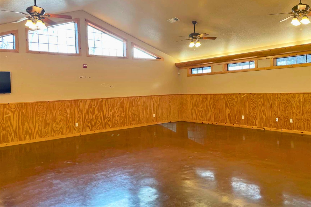 Spacious hall for events, yoga, or celebrations.