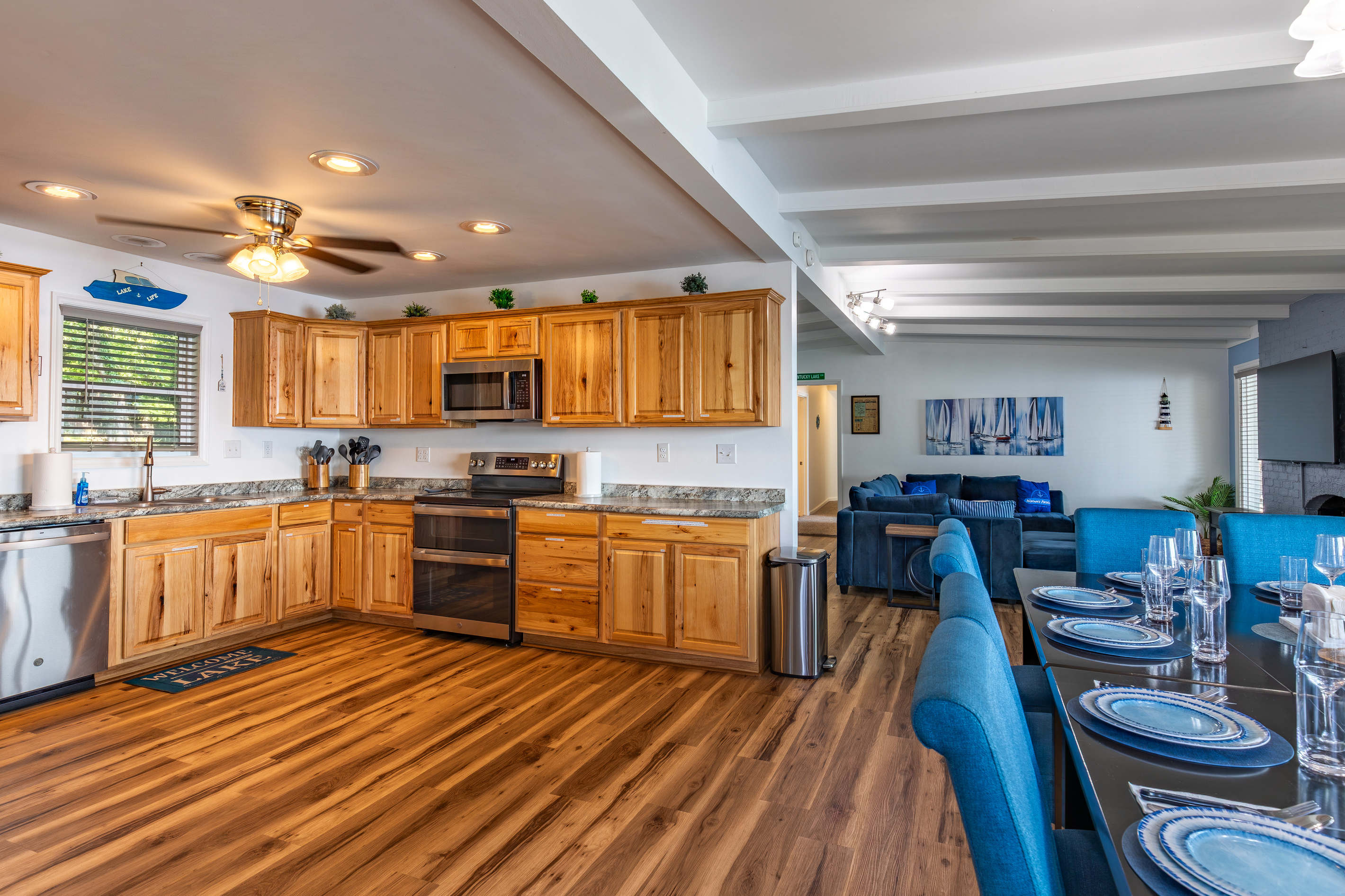 Open sightlines between the kitchen, dining room, and living area help everyone stay connected.