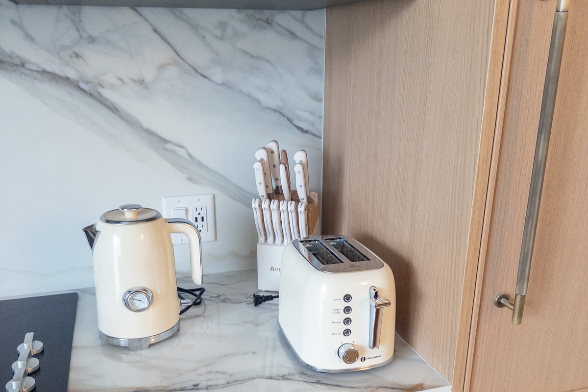 Fully equipped kitchen - marble counters, premium appliances and everyday essentials.