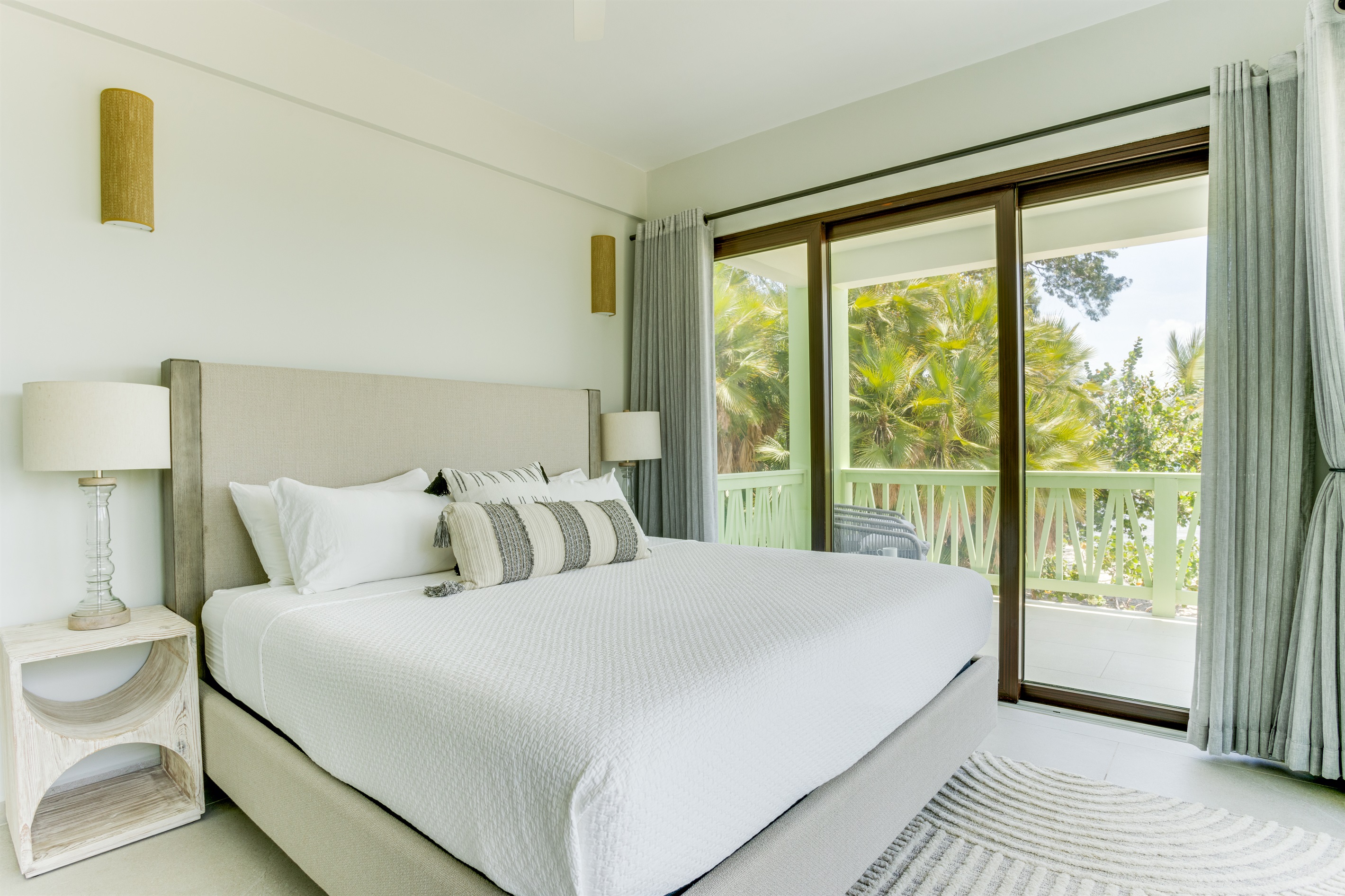 Bedroom 1: King Bed with Patio and Beach View