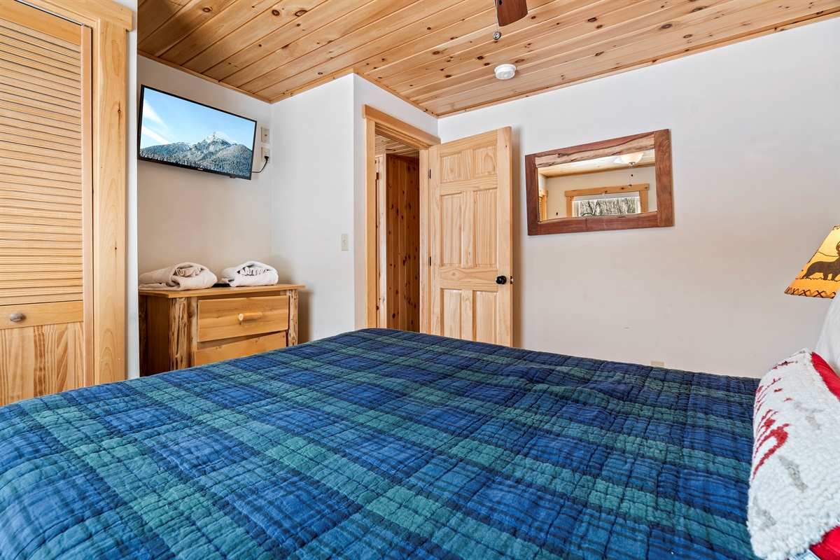 Relax in the basement’s comfortable Queen bedroom, perfect for extra guests.
