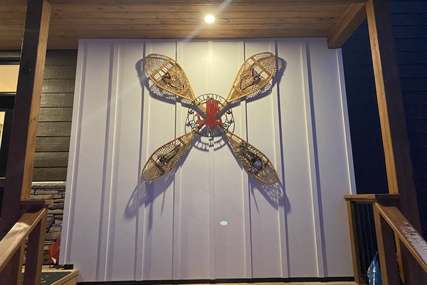 Cottage decor on front entrance wall