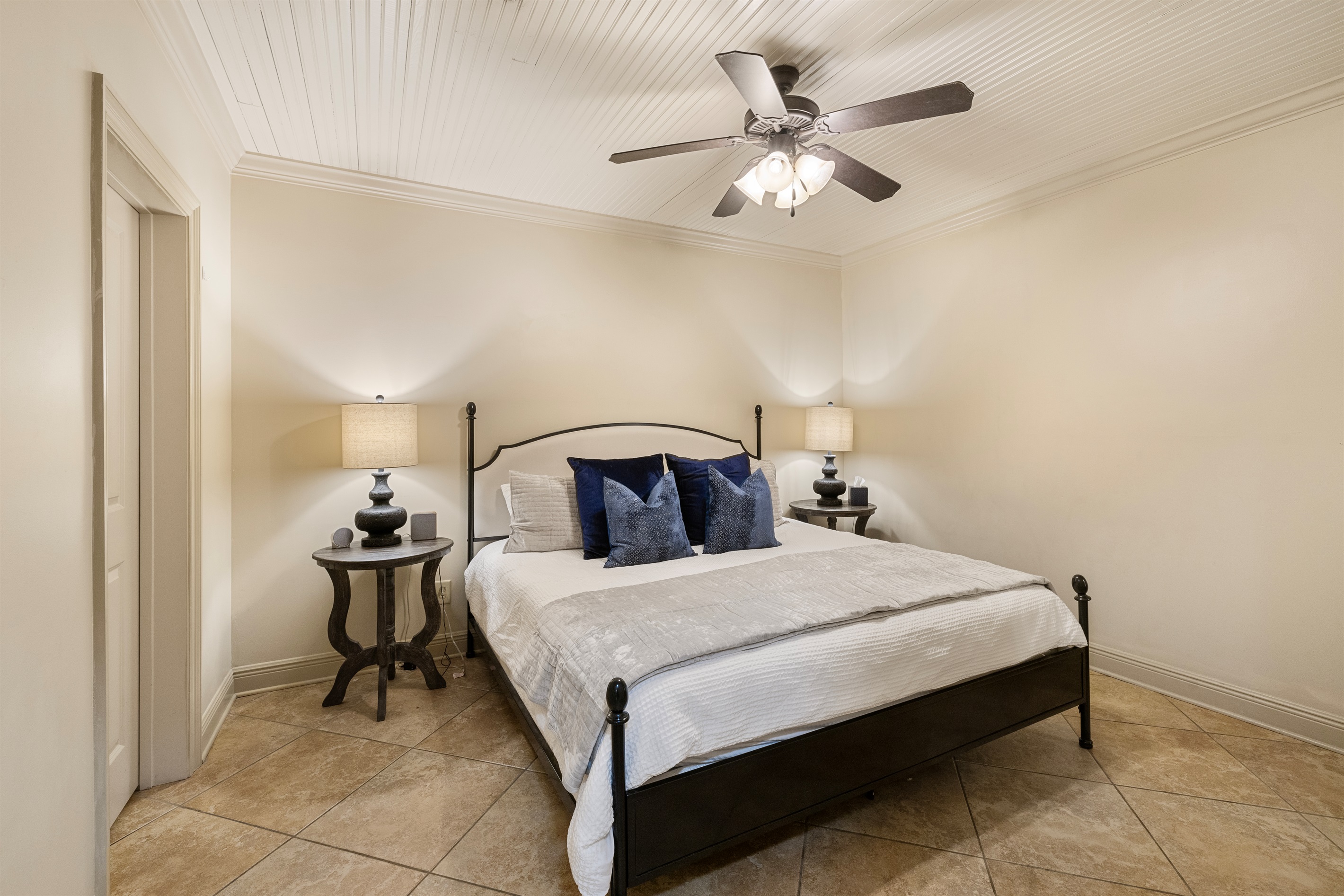 Elegant king bed, ambient lighting, and serene decor for restful nights.