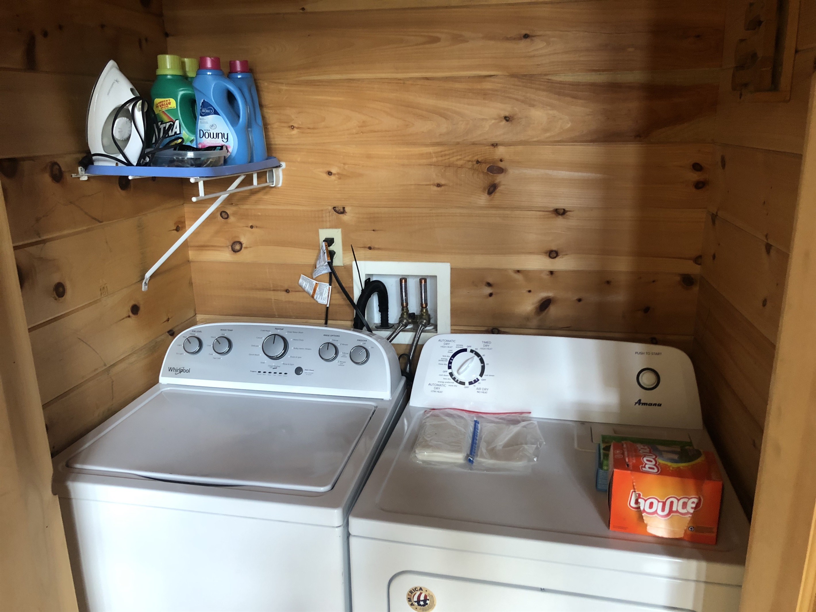 The laundry room is conveniently located on the main floor and contains a washer & dryer plus an iron.