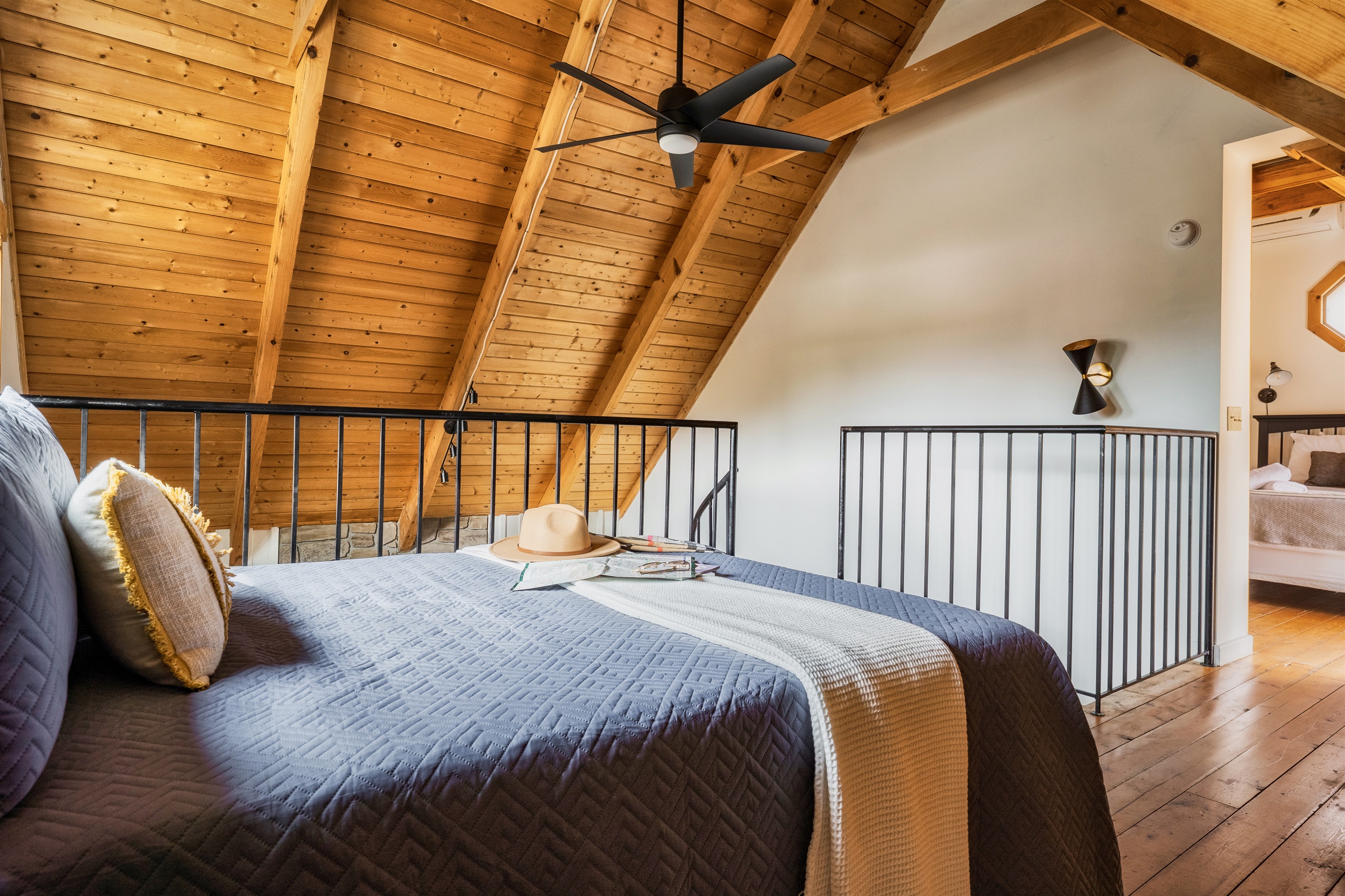 Nestled on the upper level and featuring a comfortable double bed, perfect for a peaceful night's sleep for two.