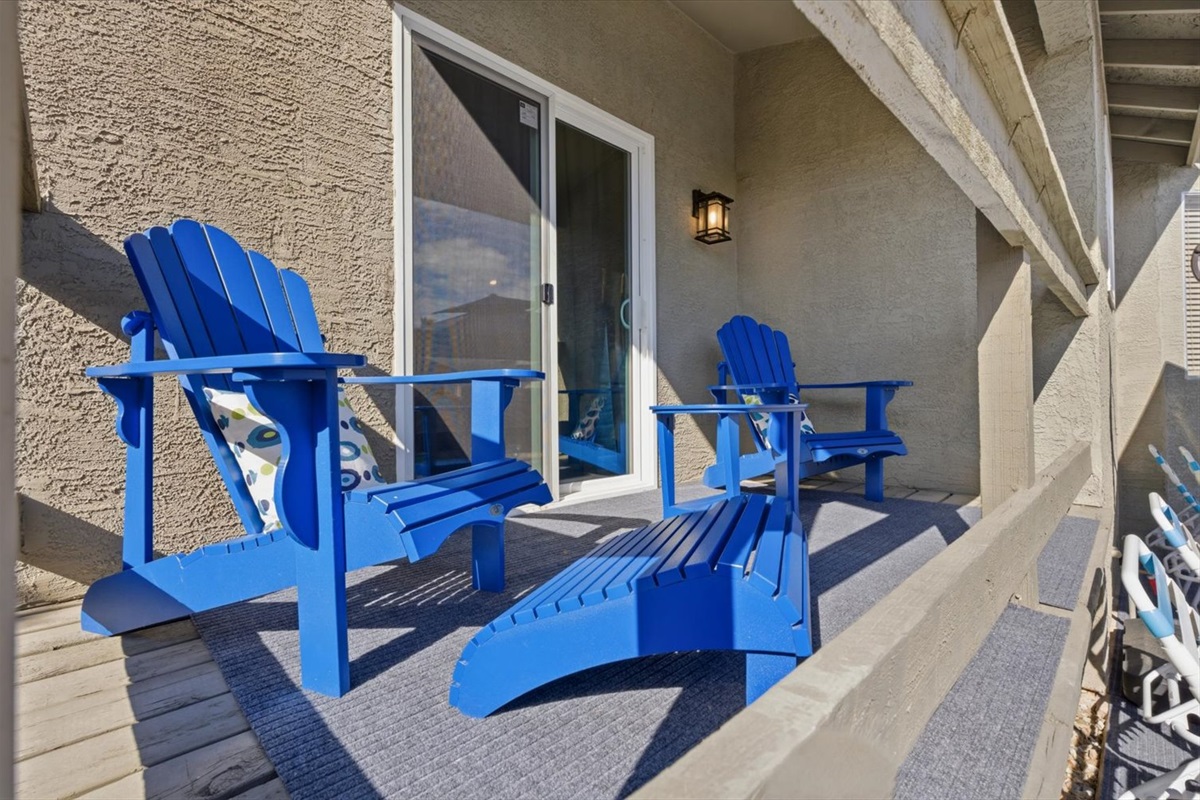 Deck overlooks the pool and fire pit in the backyard, and connect to the lounge on the interior of the. home.