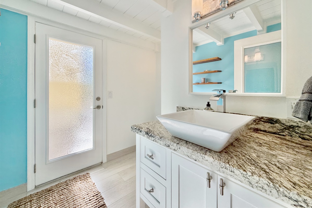 It includes a half bath that leads straight out to the pool.