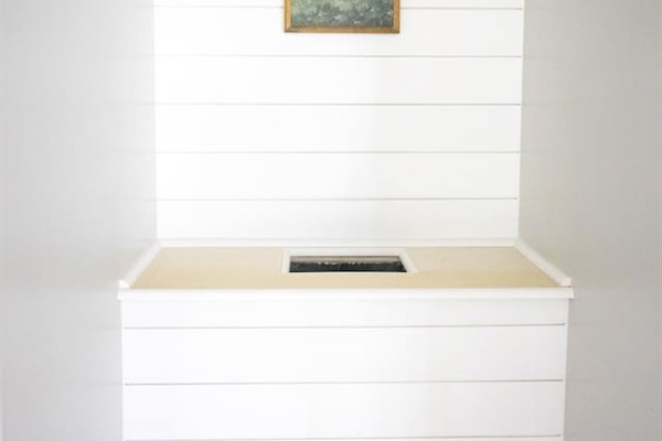 A laundry chute is available off the second floor balcony and leads directly to a giant rolling hamper in the laundry room.