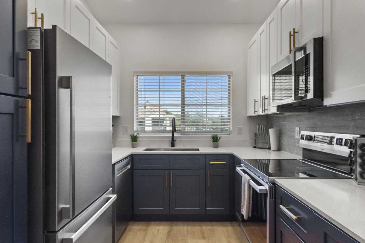 Fully equipped kitchen with full-size fridge, stove, oven, and microwave. We also provide complimentary coffee pods, creamer and sugar. 