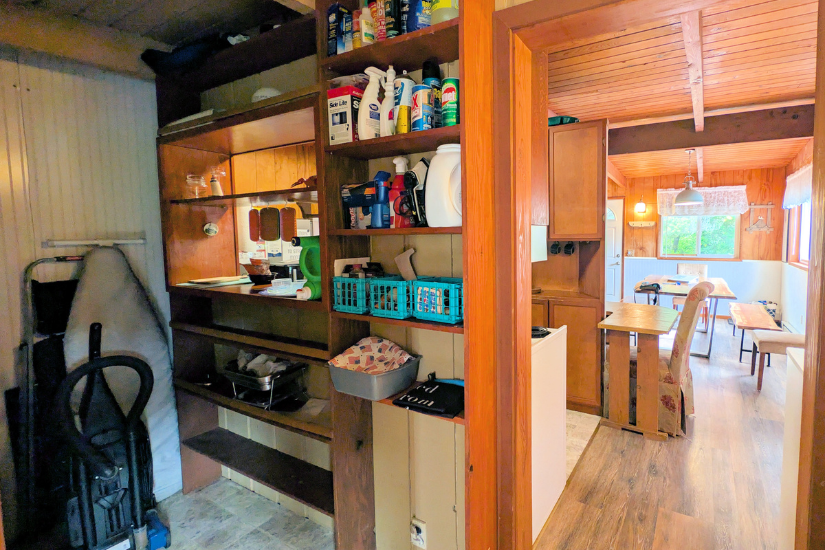 utility/laundry room between kitchen and living room