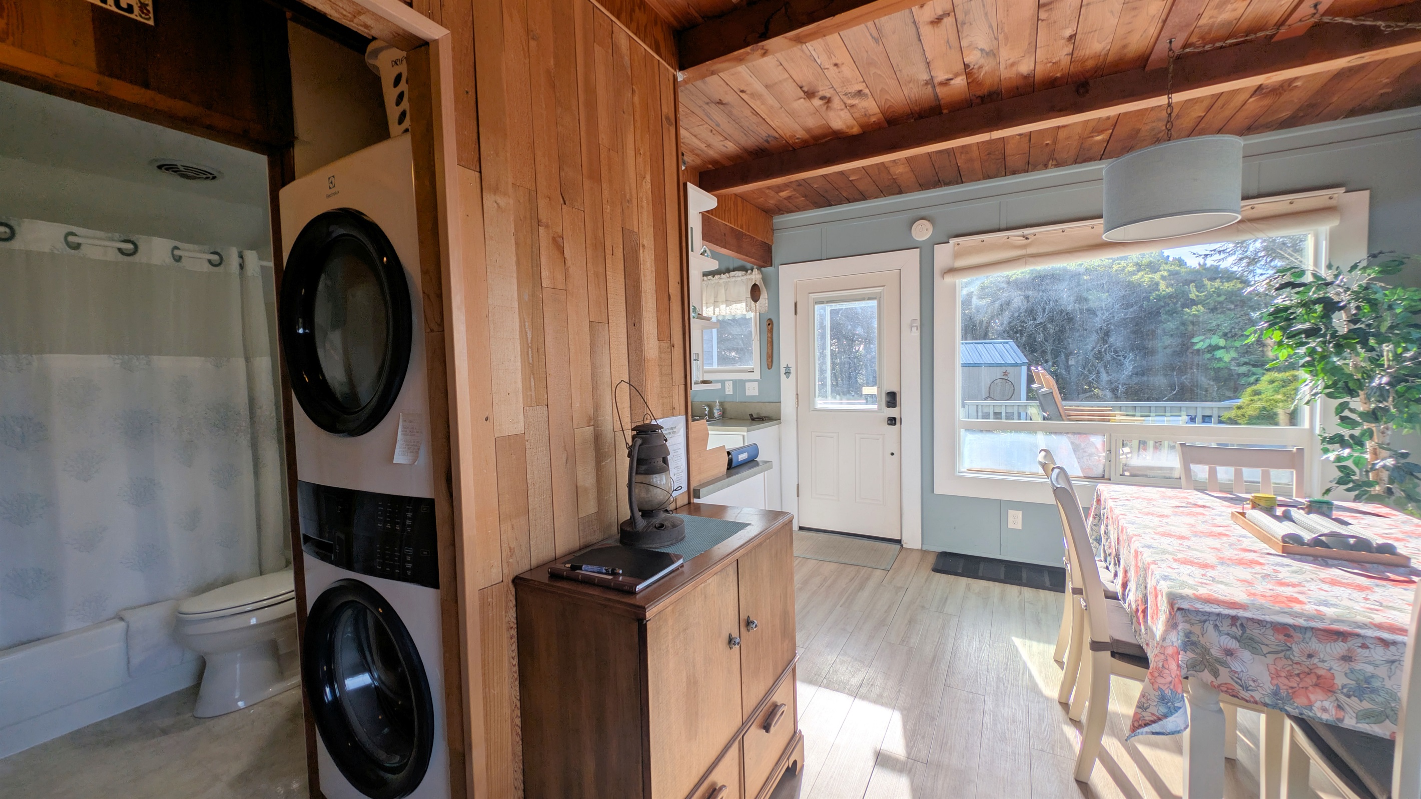 Laundry room between great room and bathroom
