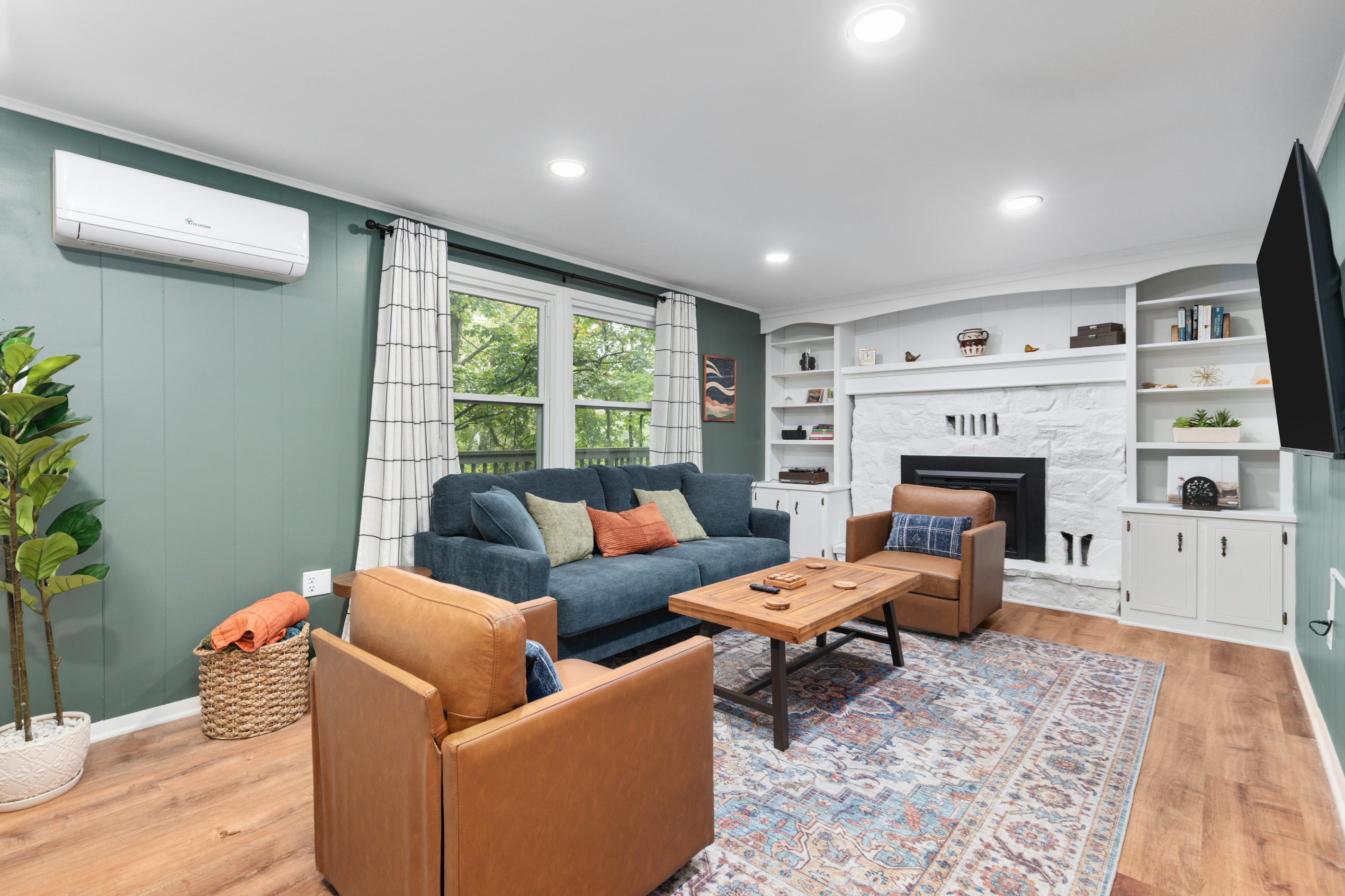 Grab a cozy blanket, curl up on the sofa by the stone fireplace, and relax to a record on the turntable, your favorite movie on the smart TV, or just some peaceful quiet.