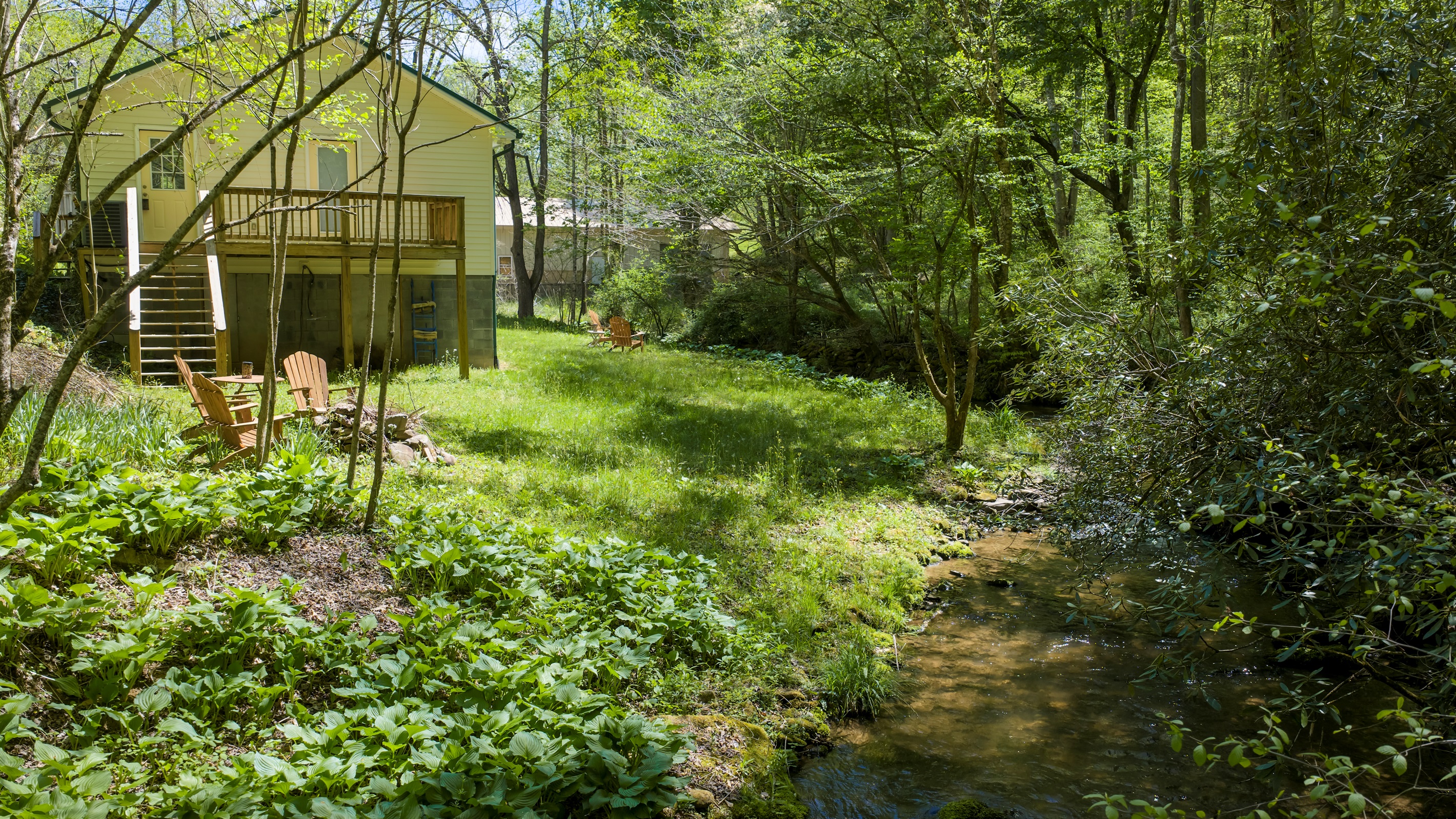 A true mountain experience, wood-burning fire pit beside Yellow Creek.