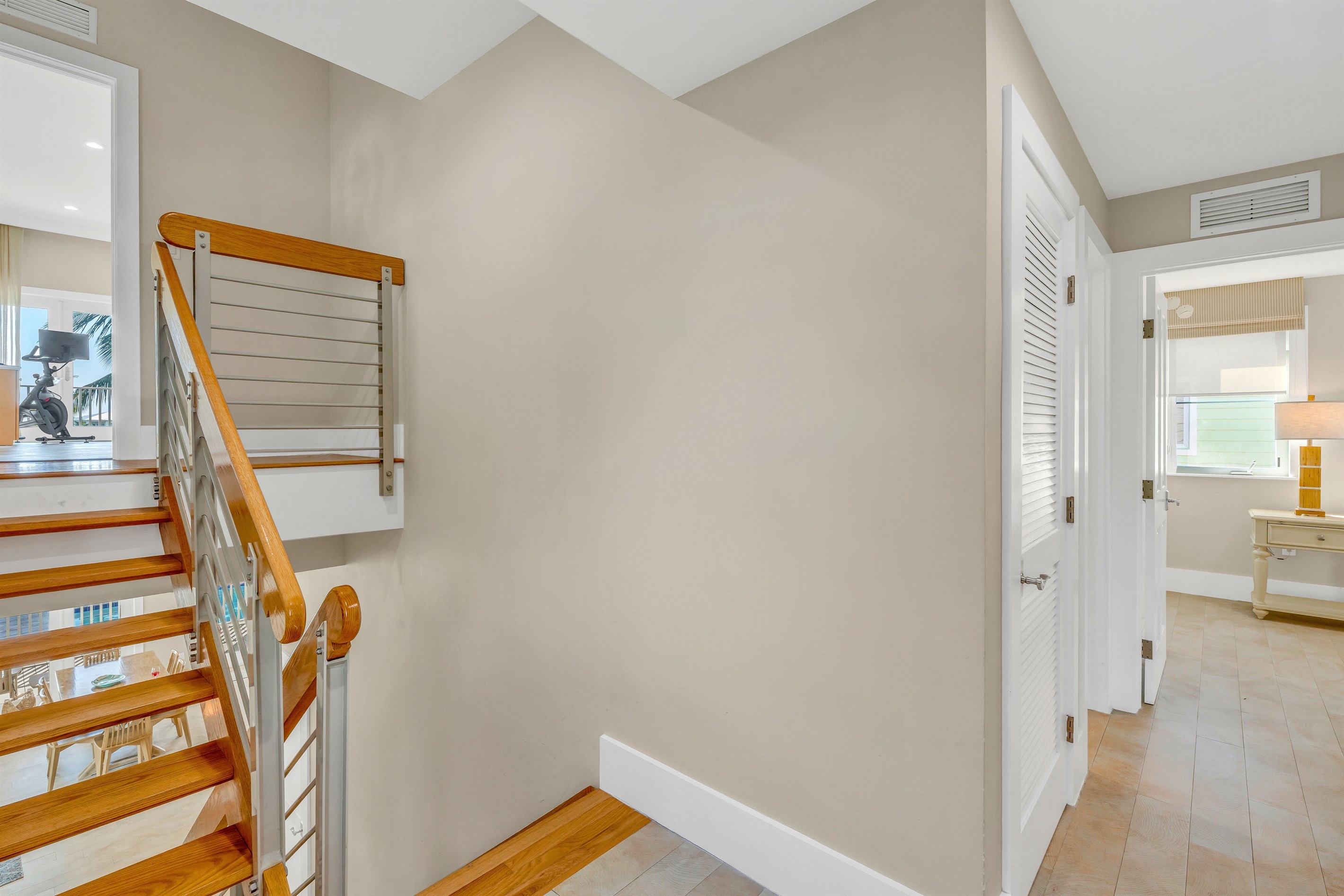 Let's head up one more half flight of stairs to the primary bedroom (#4).