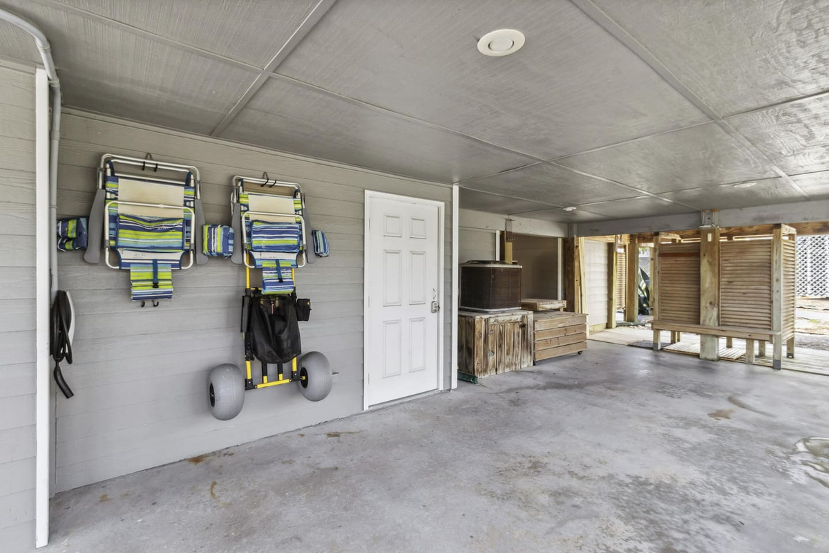 TESLA CHARGER and stocked beach items in carport!!