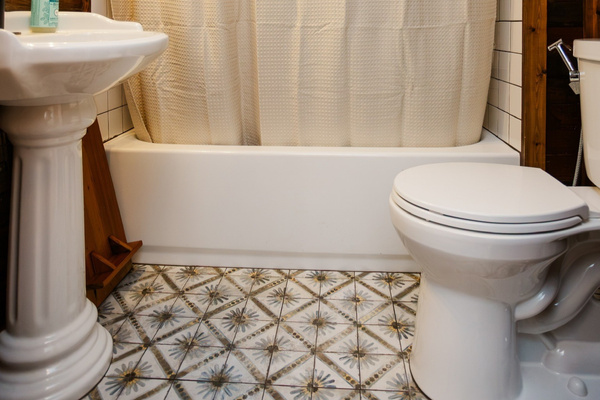 Vintage inspired tile and classic fixtures throughout. 