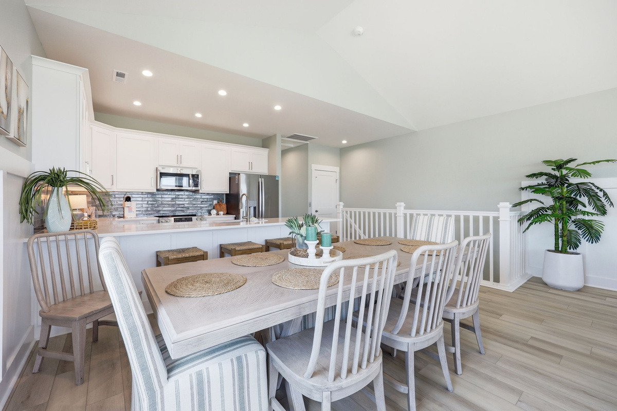 Gather for memorable meals with seating at both the dining table and spacious kitchen bar