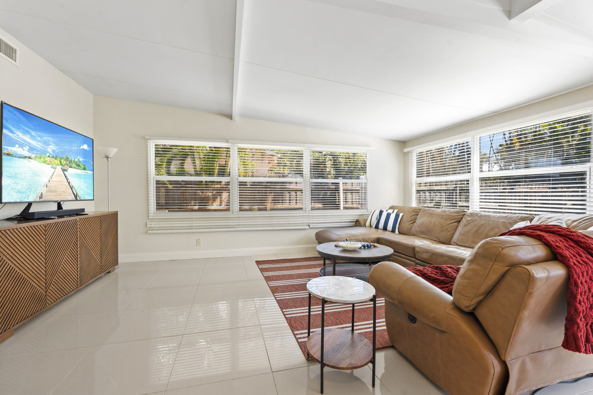 Second living room with leather reclining couch