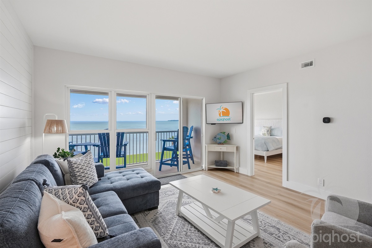 Living room with bay views through sliders