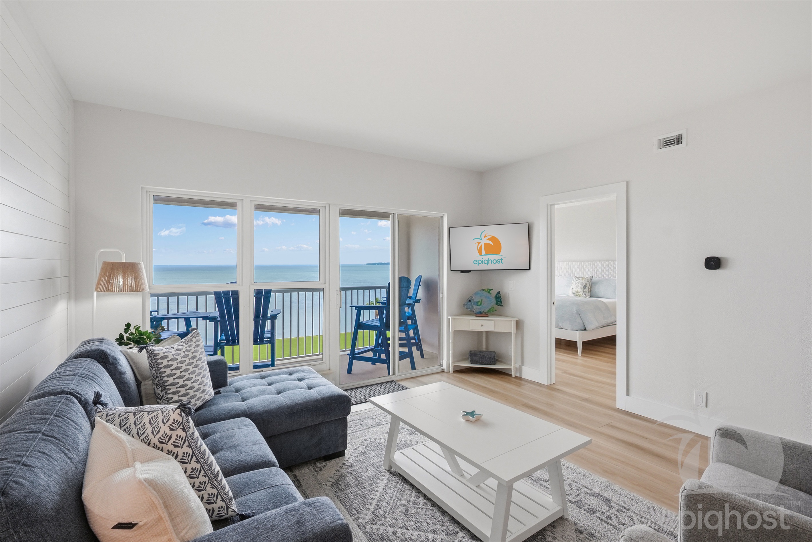 Living room with bay views through sliders