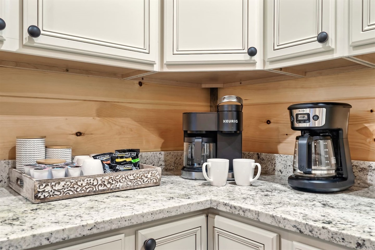 Coffee station with coffee, K cups, sugar and creamers.