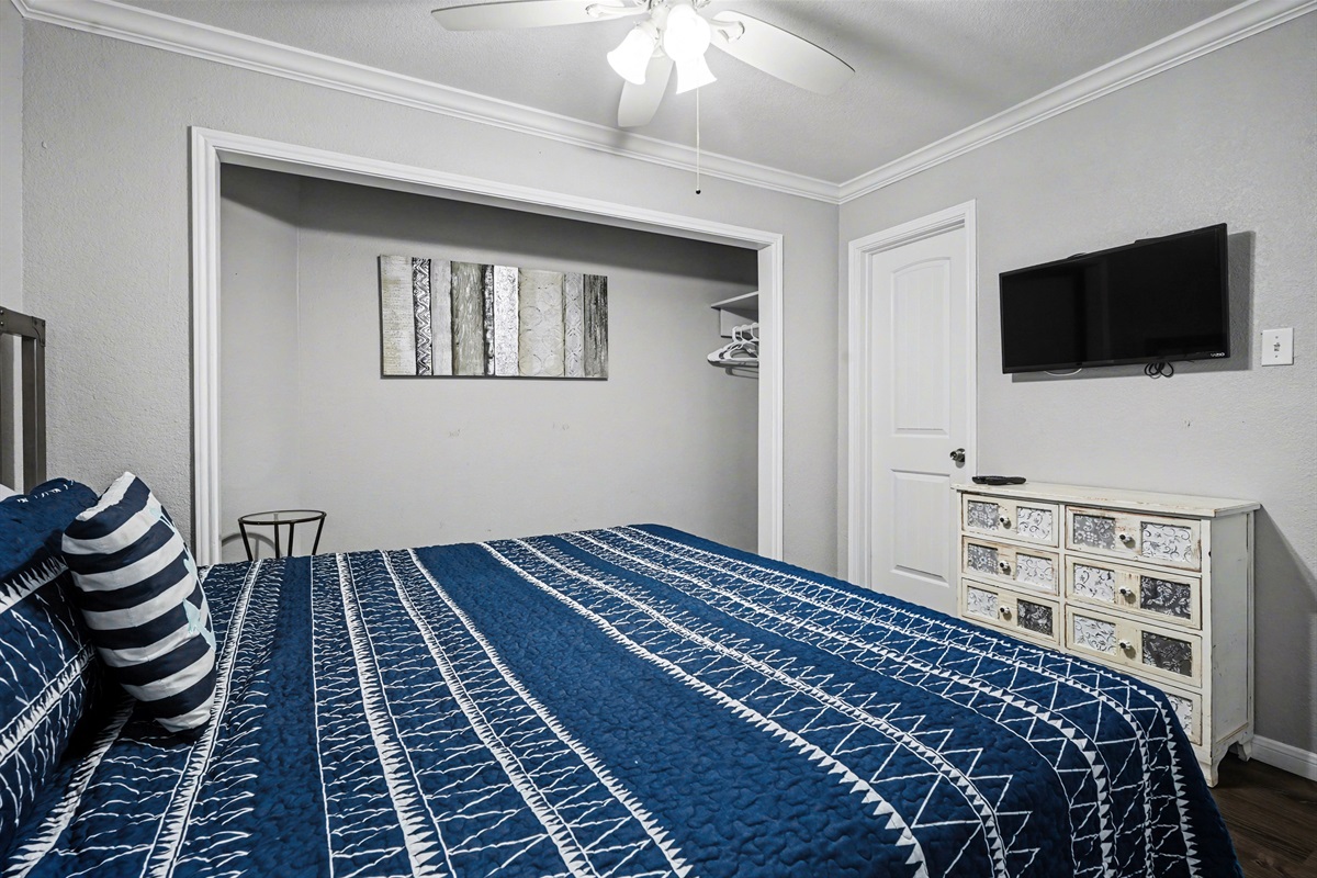 Primary bedroom with king bed