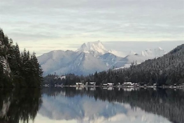 Winter scene with snow-capped mountains.