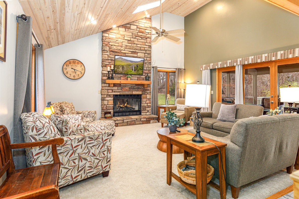 Warm and inviting living room with a gas fireplace and plenty of space for all to gather