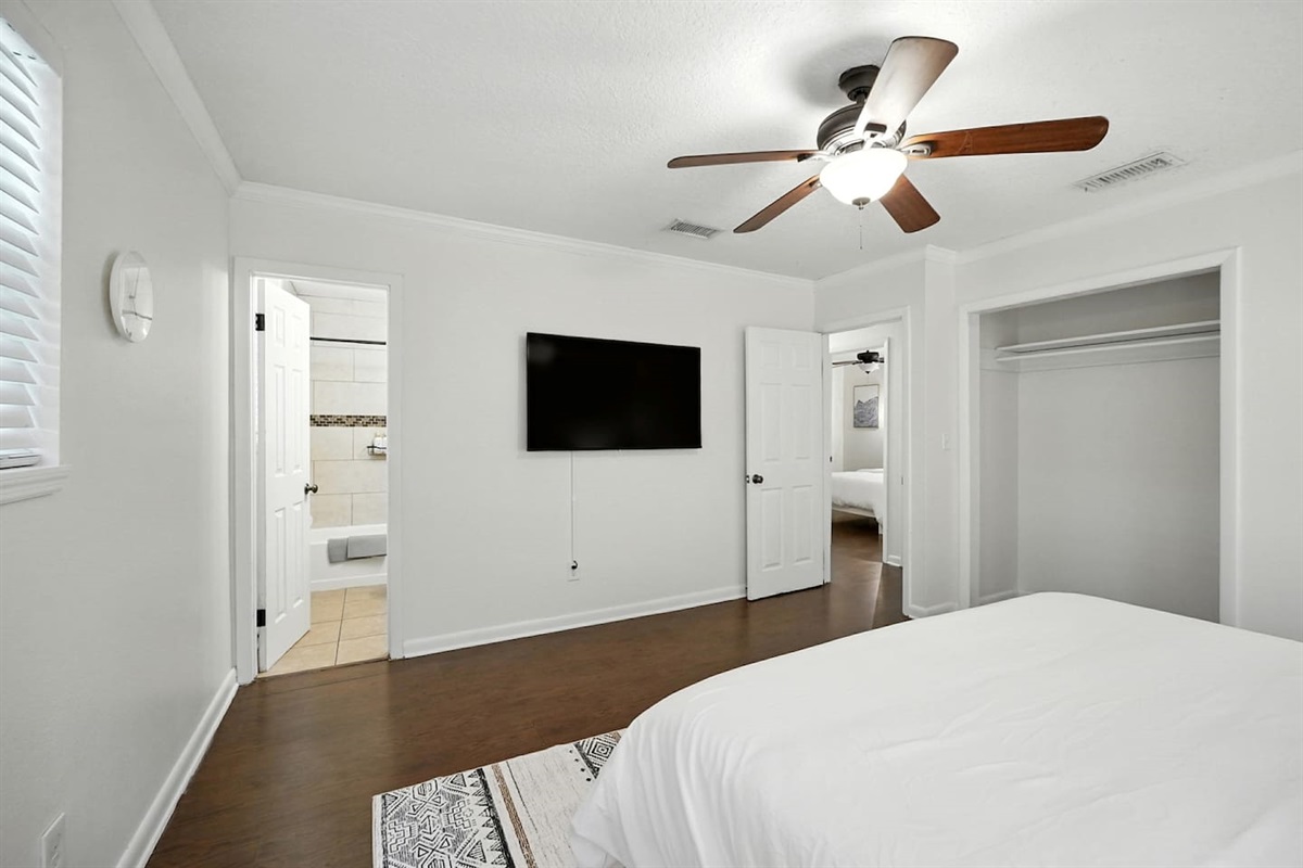 Master bedroom with 50" smart tv and ensuite full private bathroom