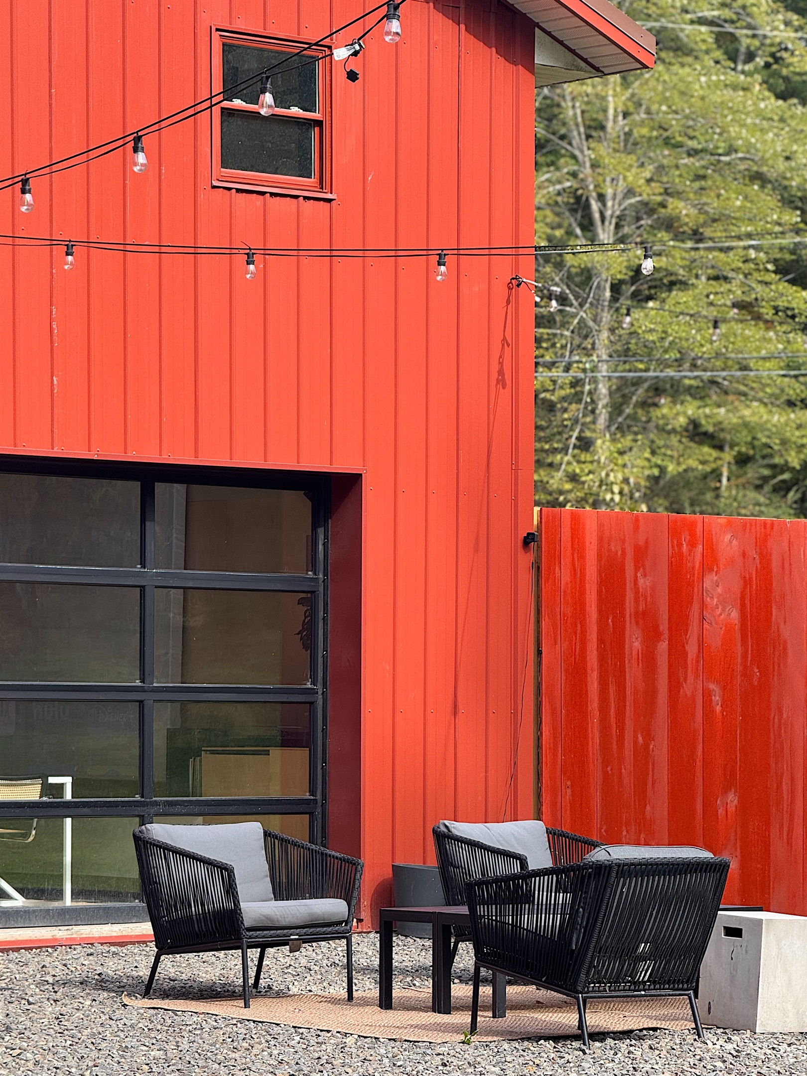 Exterior seating area with vintage Preway fireplace.
