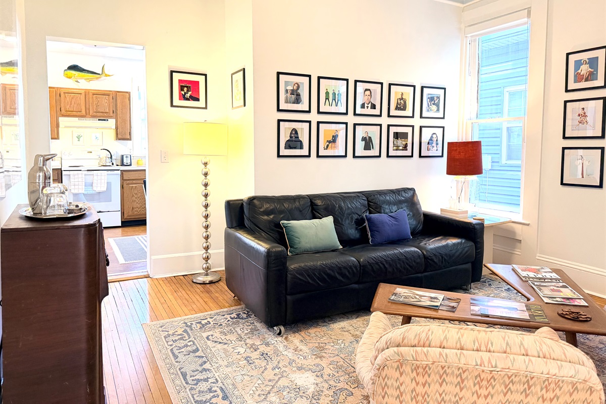 Den (second living room) ~ cozy, design-forward lounge created for conversation and slow moments — comfortable seating, curated books and games, and a relaxed, unplugged atmosphere.