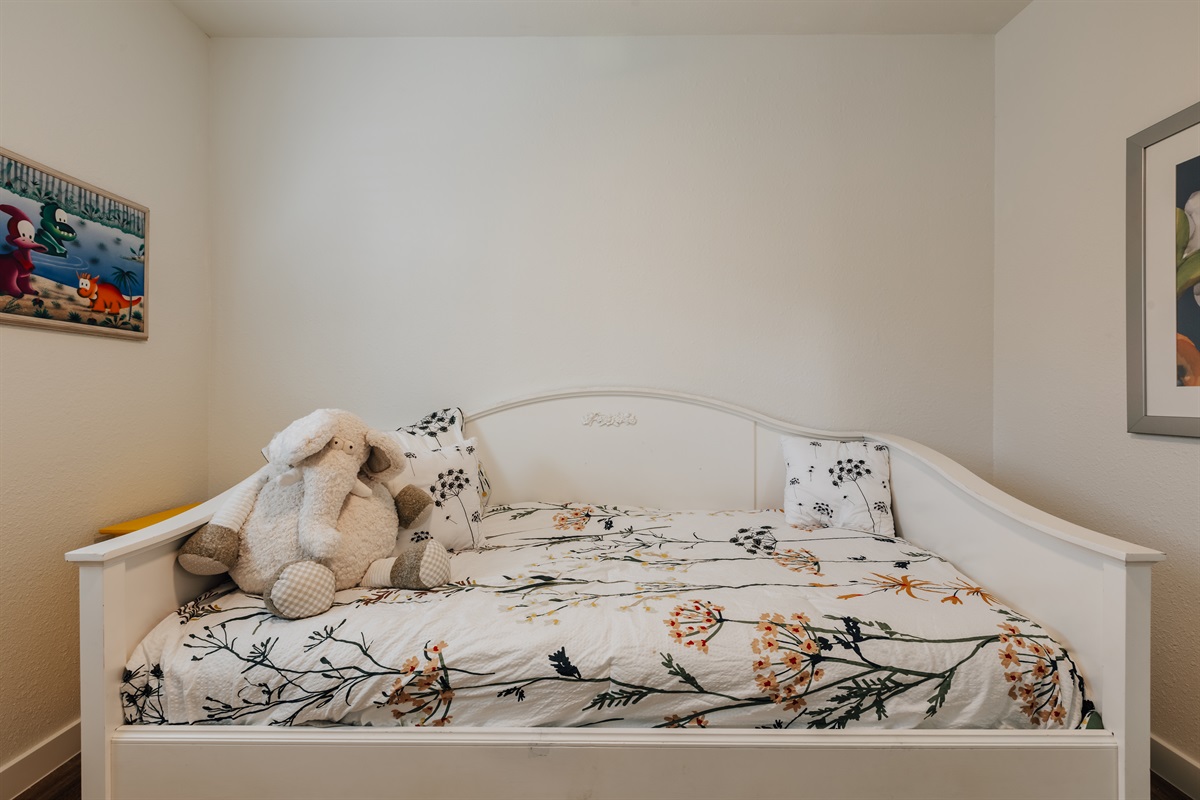 kids room with deco and two single beds