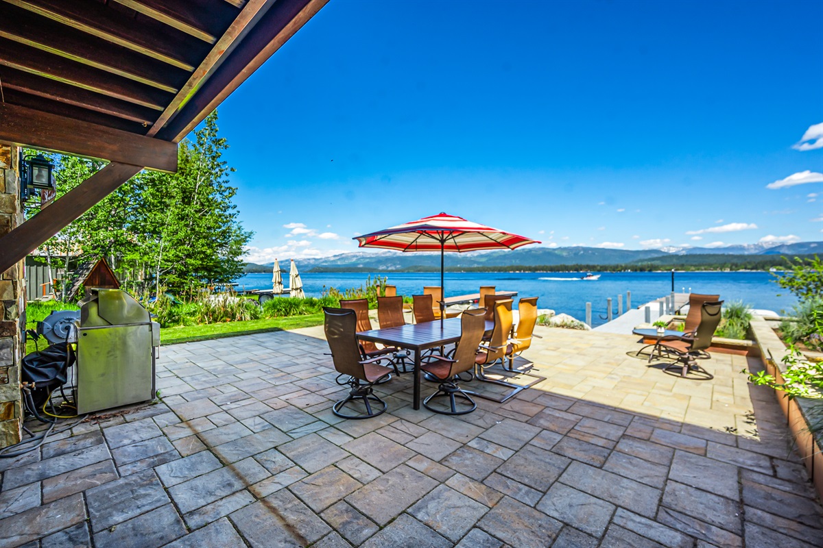 Outdoor dining area steps from the water — McCall evenings at their finest