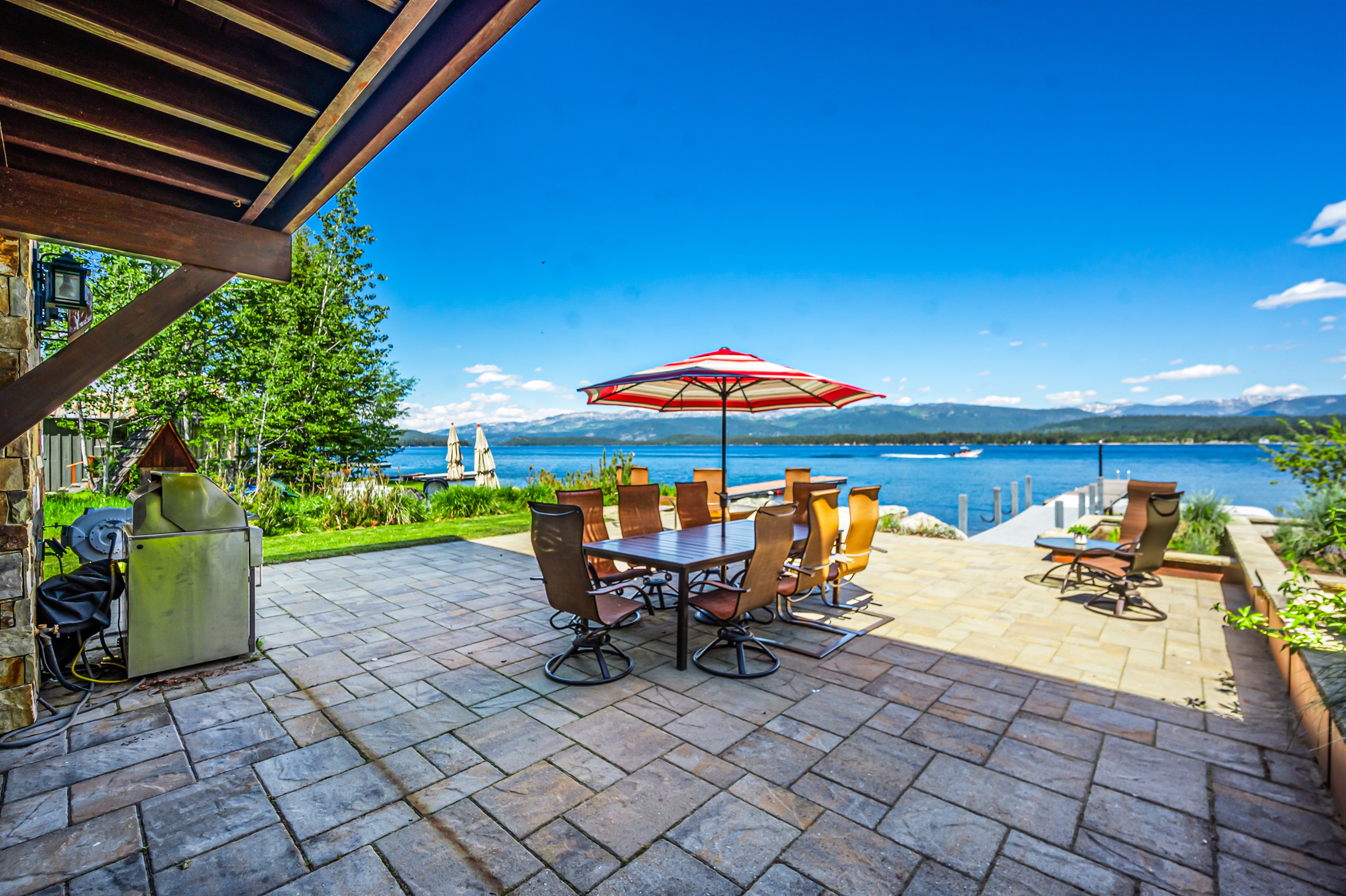 Outdoor dining area steps from the water — McCall evenings at their finest