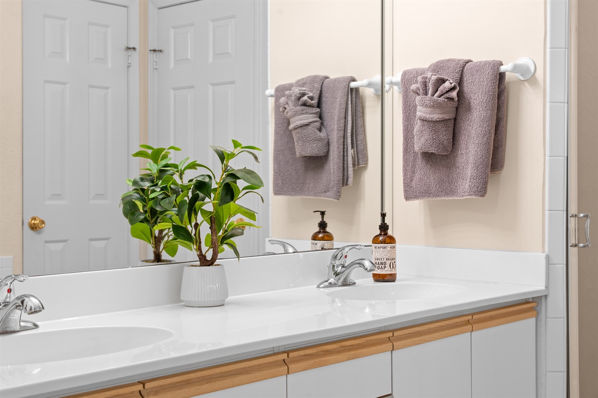 Vanity detail adds another close look at the clean, well-kept bathroom space.