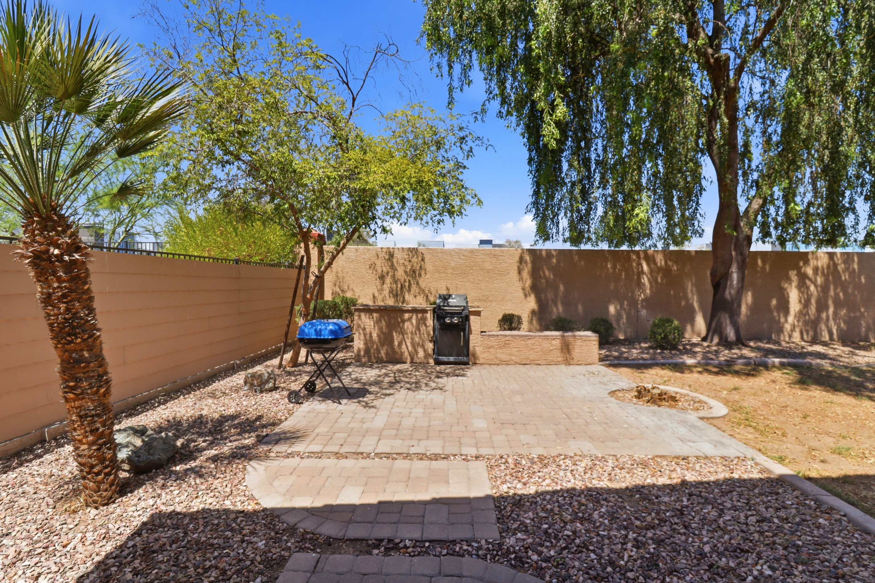 Front exterior with driveway parking for up to 2 cars and a private entrance.
