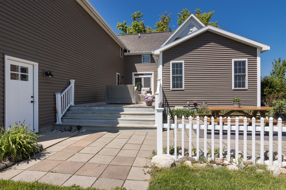 Backyard patio with easy access to the farmhouse.